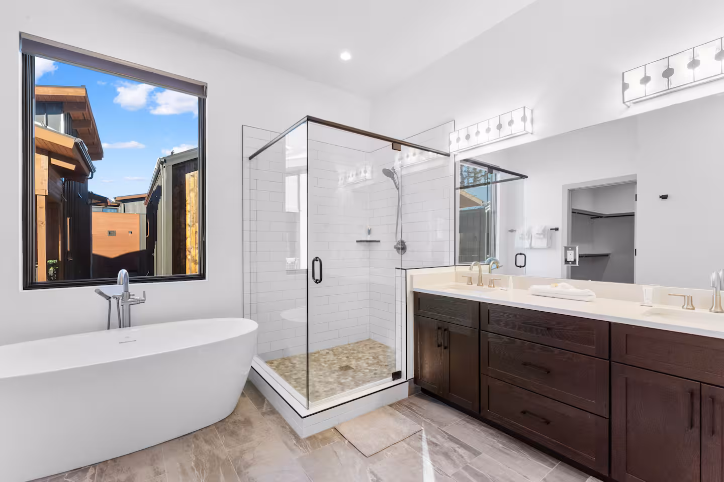 Bath with freestanding soaking tub