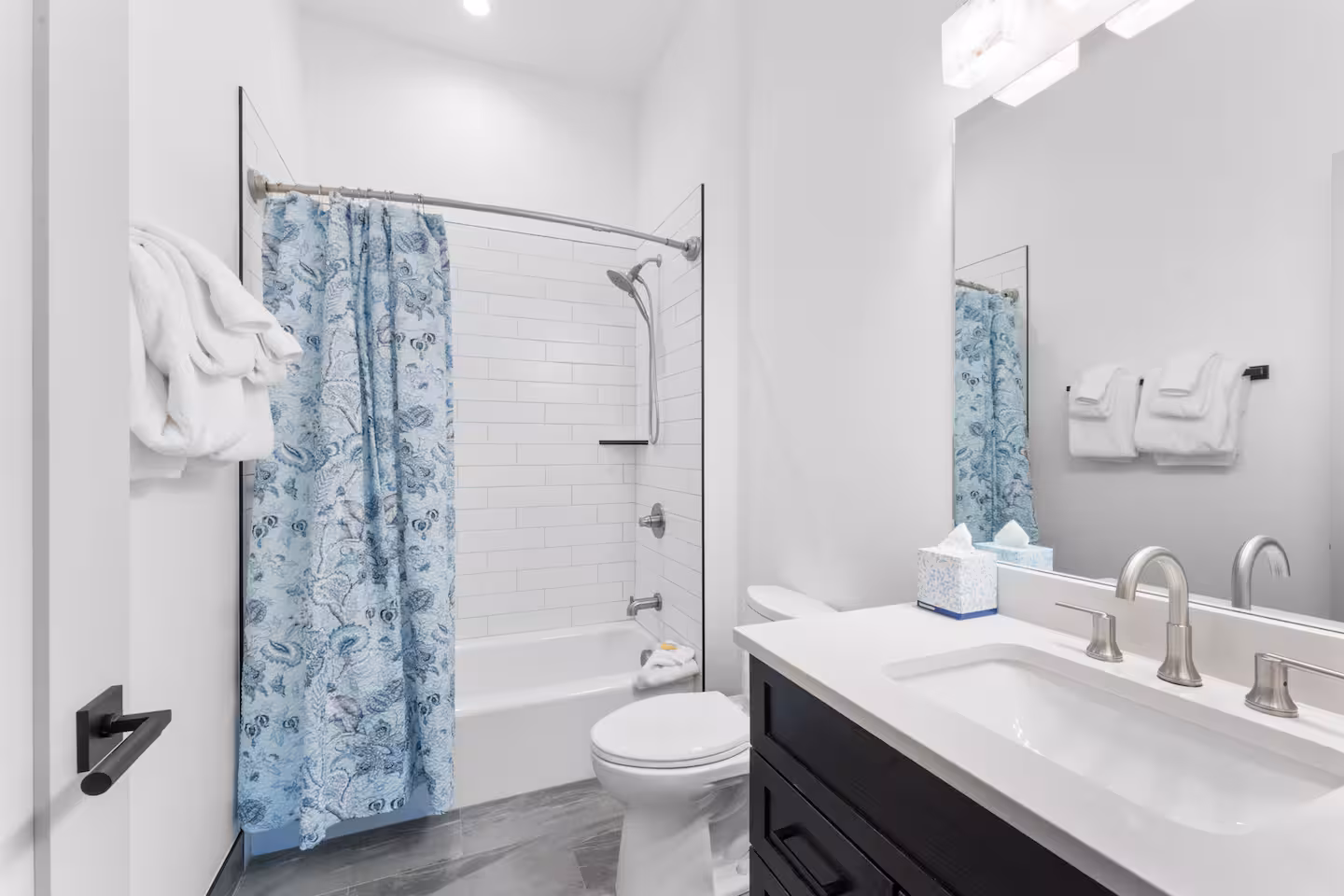Full bathroom with tub and shower